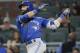 Toronto Blue Jays' Jose Bautista (19) follows through on a solo home run during the eighth inning against the Atlanta Braves in a baseball game Wednesday, May 17, 2017, in Atlanta. Atlanta won 8-4. (AP Photo/John Bazemore)