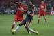 Toluca's Carlos Esquivel, left, fights for the ball with Chivas' Edwin Hernandez during a Mexico soccer league semifinal first leg match at Nemesio Diez Stadium in Toluca, Mexico, Thursday, May 18, 2017. (AP Photo/Eduardo Verdugo)