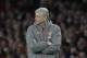 Arsenal's French manager Arsene Wenger folds his arms when the score was 0-0 during the English Premier League soccer match between Arsenal and Sunderland at the Emirates Stadium in London, Tuesday, May 16, 2017. (AP Photo/Matt Dunham)