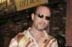 WEST HOLLYWOOD: Former World Wrestling Federation Champion X-Pac signs autographs in front of the Rainbow Bar & Grill, September 01, 2003 in West Hollywood, California. (Photo by Alexander Sibaja/Getty Images)