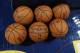 Spalding basketballs sit on court for use by the San Antonio Spurs as they face the Denver Nuggets in the first quarter of the Nuggets' 98-94 victory in an NBA preseason basketball game in Denver on Monday, Oct. 14, 2013. (AP Photo/David Zalubowski)