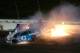 KANSAS CITY, KS - MAY 13: Joey Logano, driver of the #22 AAA Insurance Ford, Danica Patrick, driver of the #10 Wonder Woman/One Cure Ford, and Aric Almirola, driver of the #43 Smithfield Ford, crash during the Monster Energy NASCAR Cup Series Go Bowling 400 at Kansas Speedway on May 13, 2017 in Kansas City, Kansas. (Photo by Sean Gardner/Getty Images)