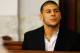 NORTH ATTLEBORO, MA - AUGUST 22: Aaron Hernandez sits in the courtroom of the Attleboro District Court during his hearing on August 22, 2013 in North Attleboro, Massachusetts. Former New England Patriot Aaron Hernandez has been indicted on a first-degree murder charge for the death of Odin Lloyd. (Photo by Jared Wickerham/Getty Images)