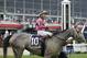 Actress with Nik Juarez atop gallops out after winning the Black-Eyed Susan horse race at Pimlico race course, Friday, May 19, 2017, in Baltimore. The 142nd Preakness Stakes horse race runs Saturday. (AP Photo/Matt Slocum)