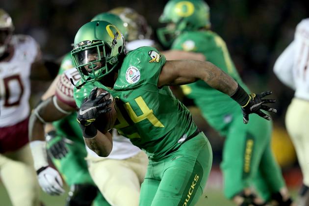 PASADENA, CA - JANUARY 01:  Running back Thomas Tyner #24 of the Oregon Ducks rushes with the ball against the Florida State Seminoles during the College Football Playoff Semifinal at the Rose Bowl Game presented by Northwestern Mutual at the Rose Bowl on January 1, 2015 in Pasadena, California.  (Photo by Stephen Dunn/Getty Images)