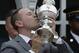 Chad Brown the trainer for Cloud Computing celebrates with the Woodlawn Vase after the horse won the 142nd Preakness Stakes horse race at Pimlico race course, Saturday, May 20, 2017, in Baltimore. (AP Photo/Matt Slocum)