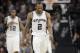 San Antonio Spurs forward Kawhi Leonard (2) and forward LaMarcus Aldridge (12) walk uproot during the second half of Game 5 in a second-round NBA basketball playoff series against the Houston Rockets, Tuesday, May 9, 2017, in San Antonio. (AP Photo/Eric Gay)