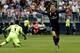 Real Madrid's Portuguese forward Cristiano Ronaldo celebrates after scoring during the Spanish league football match Malaga CF vs Real Madrid CF at La Rosaleda stadium in Malaga on May 21, 2017. / AFP PHOTO / JOSE JORDAN (Photo credit should read JOSE JORDAN/AFP/Getty Images)