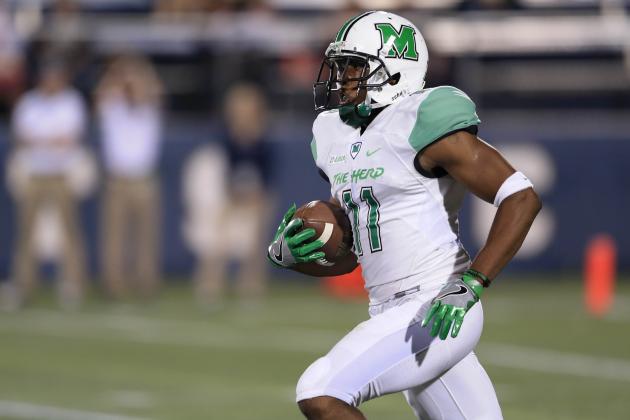 MIAMI, FL - NOVEMBER 19: Rodney Allen #11 of the Marshall Thundering Herd returns an intercepted pass during the first quarter of the game against the FIU Panthers on November 19, 2016 in Miami, Florida. (Photo by Rob Foldy/Getty Images)