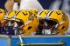 LSU helmets sit on the bench area during the Texas Bowl NCAA football game Tuesday, Dec. 29, 2015, in Houston. LSU won 56-27. (AP Photo/Bob Levey)