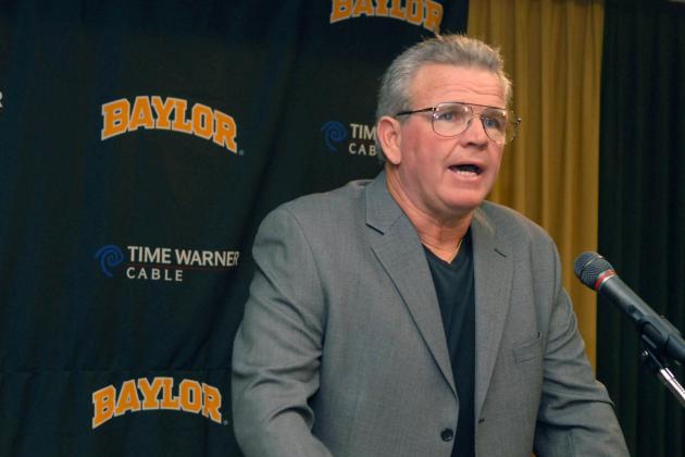 Baylor football coach Guy Morriss reads a short statement after it was announced by school officials, Sunday, Nov. 18, 2007, in Waco, Texas, that he would not return as head coach. Morris leaves the school after five years with a 18-40 overall record. (AP Photo/Waco Tribune Herald, Rod Aydelotte)