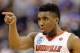 INDIANAPOLIS, IN - MARCH 19: Donovan Mitchell #45 of the Louisville Cardinals reacts against the Michigan Wolverines in the first half during the second round of the 2017 NCAA Men's Basketball Tournament at the Bankers Life Fieldhouse on March 19, 2017 in Indianapolis, Indiana. (Photo by Andy Lyons/Getty Images)