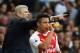 Arsenal's French manager Arsene Wenger (L) gestures alongside Arsenal's Chilean striker Alexis Sanchez during the English Premier League football match between Tottenham Hotspur and Arsenal at White Hart Lane in London, on April 30, 2017. / AFP PHOTO / IKIMAGES / Ian KINGTON / RESTRICTED TO EDITORIAL USE. No use with unauthorized audio, video, data, fixture lists, club/league logos or 'live' services. Online in-match use limited to 75 images, no video emulation. No use in betting, games or single club/league/player publications. / (Photo credit should read IAN KINGTON/AFP/Getty Images)