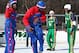 Kris Hi-Lite Bruton, lft, of the Harlem Globetrotters, toys with teammate Kevin Turbo Pearson as they act as quarterback and snapper as they team took on the Washington Generals during a basketball game on the outdoor ice rink at Lasker Rink in New York's Central Park on Tuesday, Feb. 9, 2010. (AP Photo/Craig Ruttle)