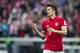 MUNICH, GERMANY - APRIL 08: Robert Lewandowski of FC Bayern Muenchen celebrates after scoring his team's fourth goal by penalty during the Bundesliga match between Bayern Muenchen and Borussia Dortmund at Allianz Arena on April 8, 2017 in Munich, Germany. (Photo by Boris Streubel/Getty Images)