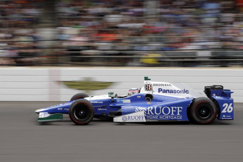 Takuma Sato, of Japan, heads into the first turn during the running of the Indianapolis 500 auto race at Indianapolis Motor Speedway, Sunday, May 28, 2017, in Indianapolis. (AP Photo/Darron Cummings)