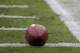 A football is shown next to a Salute to Service symbol on an end zone pylon before an NFL football game between the San Francisco 49ers and the Atlanta Falcons in Santa Clara, Calif., Sunday, Nov. 8, 2015. (AP Photo/Marcio Jose Sanchez)