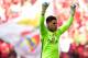 Benfica's Brazilian goalkeeper Ederson Moraes celebrates their second goal scored by teammate Mexican forward Raul Jimenez during the Portuguese league football match SL Benfica vs Vitoria Guimaraes SC at the Luz stadium in Lisbon on May 13, 2017. / AFP PHOTO / MIGUEL RIOPA (Photo credit should read MIGUEL RIOPA/AFP/Getty Images)