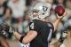 OAKLAND, CA - DECEMBER 24: Quarterback Derek Carr #4 of the Oakland Raiders throws the ball against the Indianapolis Colts in the third quarter on December 24, 2016 at Oakland-Alameda County Coliseum in Oakland, California. The Raiders won 33-25. (Photo by Brian Bahr/Getty Images)