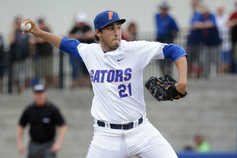 Florida's Alex Faedo pitches in the second inning of an NCAA college baseball tournament super regional game against Florida State, Saturday, June 11, 2016, in Gainesville, Fla. (AP Photo/John Raoux)