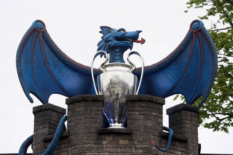 CARDIFF, WALES - MAY 29:  A large blue dragon with a Champions League trophy is seen in Cardiff Castle in Cardiff city centre on May 29, 2017 in Cardiff, Wales. Preparations are underway for the UEFA Champions League final which will be held on June 3 at the National Stadium of Wales in Cardiff. Extra security measures have been put in place in the city centre. The terror threat level has been reduced from critical to severe following a terrorist attack in which 22 people were killed at an Ariana Grande concert in Manchester.  (Photo by Matthew Horwood/Getty Images)