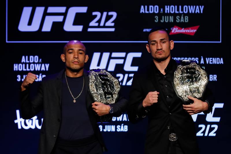 RIO DE JANEIRO, BRAZIL - APRIL 11: UFC Featherweight Champion Jose Aldo of Brazil (L) and challenger Max Holloway of the United States pose for photographers during the UFC 212 press conference at Morro da Urca on April 11, 2017 in Rio de Janeiro, Brazil. (Photo by Buda Mendes/Getty Images)