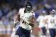 DETROIT, MI - DECEMBER 11: Cameron Meredith #81 of the Chicago Bears runs with the ball after a catch against the Detroit Lions late in the fourth quarter at Ford Field on December 11, 2016 in Detroit, Michigan. (Photo by Rey Del Rio/Getty Images)