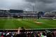 BIRMINGHAM, ENGLAND - JUNE 02: Dark skies approach as Adam Milne of New Zealand dismisses Aaron Finch of Australia during the ICC Champions Trophy match between Australia and New Zealand at Edgbaston on June 2, 2017 in Birmingham, England. (Photo by Gareth Copley/Getty Images)