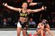 RIO DE JANEIRO, BRAZIL - JUNE 03: Claudia Gadelha of Brazil celebrates after her submission victory over Karolina Kowalkiewicz of Poland in their womens strawweight bout during the UFC 212 event at Jeunesse Arena on June 3, 2017 in Rio de Janeiro, Brazil. (Photo by Jeff Bottari/Zuffa LLC/Zuffa LLC via Getty Images)