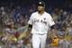 Miami Marlins starting pitcher Edinson Volquez walks to the dugout after pitching during a baseball game against the New York Mets, Friday, April 14, 2017, in Miami. (AP Photo/Lynne Sladky)