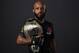 KANSAS CITY, MO - APRIL 15: UFC flyweight champion Demetrious Johnson poses for a post fight portrait backstage during the UFC Fight Night event at Sprint Center on April 15, 2017 in Kansas City, Missouri. (Photo by Mike Roach/Zuffa LLC/Zuffa LLC via Getty Images)