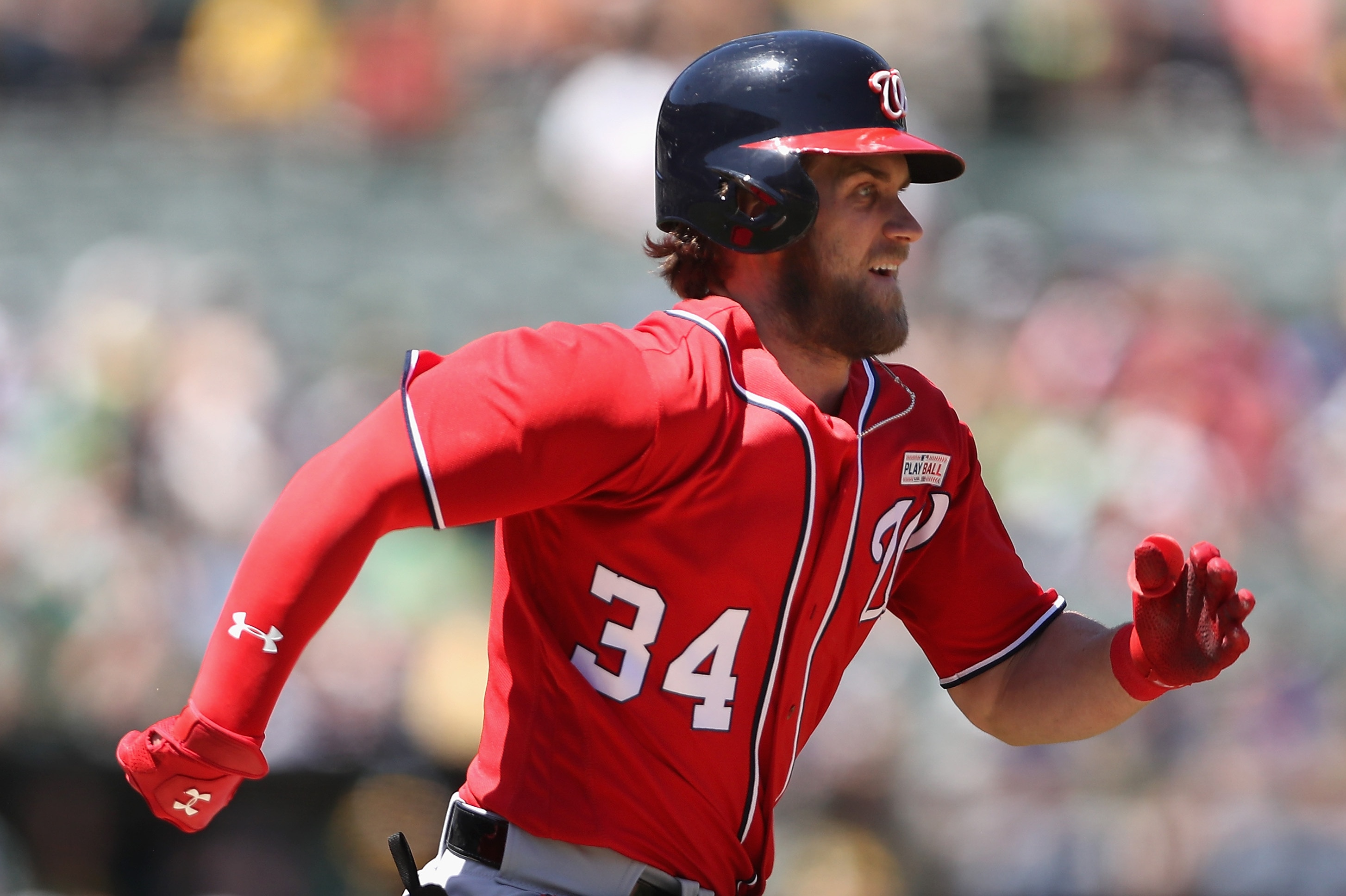 OAKLAND, AZ - JUNE 04: Bryce Harper #34 of the Washington Nationals runs to first base to reach on a wild pitch strike out during the sixth inning of the MLB game against the Oakland Athletics at Oakland Coliseum on June 4, 2017 in Oakland, California. (Photo by Christian Petersen/Getty Images)