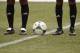 VANCOUVER, CANADA - AUGUST 10: A generic view of an Adidas soccer ball as well as two soccer players sporting Adidas socks and shoes prior to an MLS match between the Vancouver Whitecaps and the San Jose Earthquakes at B.C. Place on August 10, 2013 in Vancouver, British Columbia, Canada. (Photo by Derek Leung/Getty Images)
