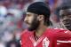 San Francisco 49ers quarterback Colin Kaepernick stands on the sideline during the second half of an NFL football game against the Seattle Seahawks in Santa Clara, Calif., Sunday, Jan. 1, 2017. (AP Photo/Tony Avelar)