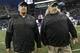 Buffalo Bills head coach Rex Ryan, left, stands with his twin brother, Rob Ryan, right, assistant head coach - defence, during warmups before an NFL football game against the Seattle Seahawks, Monday, Nov. 7, 2016, in Seattle. (AP Photo/Elaine Thompson)
