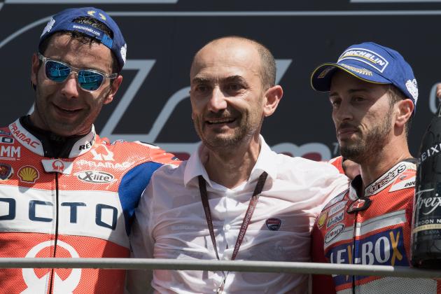 SCARPERIA, ITALY - JUNE 04: (L-R) Danilo Petrucci of Italy and Octo Pramac Yakhnich,  Claudio Domenicali of Italy  and Andrea Dovizioso of Italy and Ducati Team celebrate on the podium at the end of the MotoGP race during the MotoGp of Italy - Race at Mugello Circuit on June 4, 2017 in Scarperia, Italy.  (Photo by Mirco Lazzari gp/Getty Images)