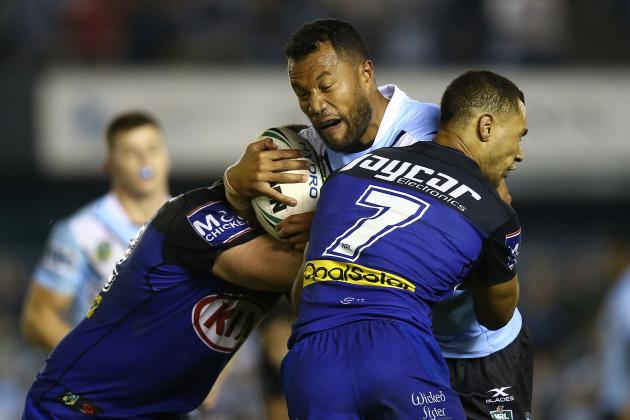 SYDNEY, AUSTRALIA - MAY 27:  Jayson Bukuya of the Sharks is tackled during the round 12 NRL match between the Cronulla Sharks and the Canterbury Bulldogs at Southern Cross Group Stadium on May 27, 2017 in Sydney, Australia.  (Photo by Mark Metcalfe/Getty Images)