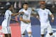 (L-R) England's defender Kyle Walker-Peters, forward Dominic Solanke and forward Ademola Lookman celebrates a goal during the U-20 World Cup semi-final football match between England and Italy in Jeonju on June 8, 2017. / AFP PHOTO / JUNG Yeon-Je (Photo credit should read JUNG YEON-JE/AFP/Getty Images)