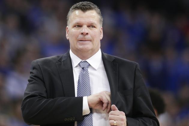 Creighton coach Greg McDermott reaches for his notes during the first half of an NCAA college basketball game against Georgetown in Omaha, Neb., Sunday, Feb. 19, 2017. (AP Photo/Nati Harnik)