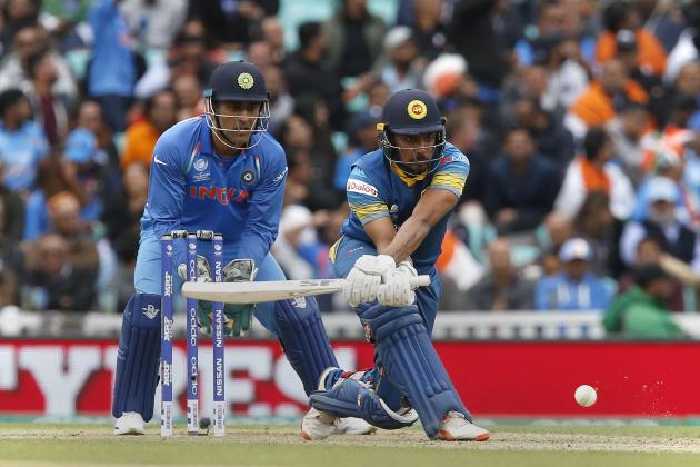 Sri Lankas Danushka Gunathilaka hits a reverse sweep shot during the ICC Champions Trophy match between India and Sri Lanka at The Oval in London on June 8, 2017. / AFP PHOTO / Ian KINGTON / RESTRICTED TO EDITORIAL USE        (Photo credit should read IAN KINGTON/AFP/Getty Images)