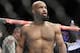 Demetrious Johnson reacts after defeating Tim Elliott during a mixed martial arts flyweight bout Saturday, Dec. 3, 2016, in Las Vegas. (AP Photo/John Locher)
