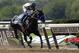Jockey Mike Smith, riding Mor Spirit, crosses the finish line to win The Mohegan Sun Metropolitan, his fifth win of the day, at Belmont Park on Saturday, June 10, 2017, in Elmont, N.Y. (AP Photo/Peter Morgan)