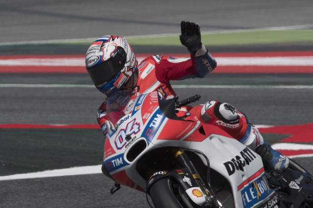 MONTMELO, SPAIN - JUNE 10:  Andrea Dovizioso of Italy and Ducati Team
 greets the fans during the MotoGp of Catalunya - Qualifying at Circuit de Catalunya on June 10, 2017 in Montmelo, Spain.  (Photo by Mirco Lazzari gp/Getty Images)