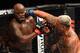 Mark Hunt drills Derrick Lewis with an overhand right.