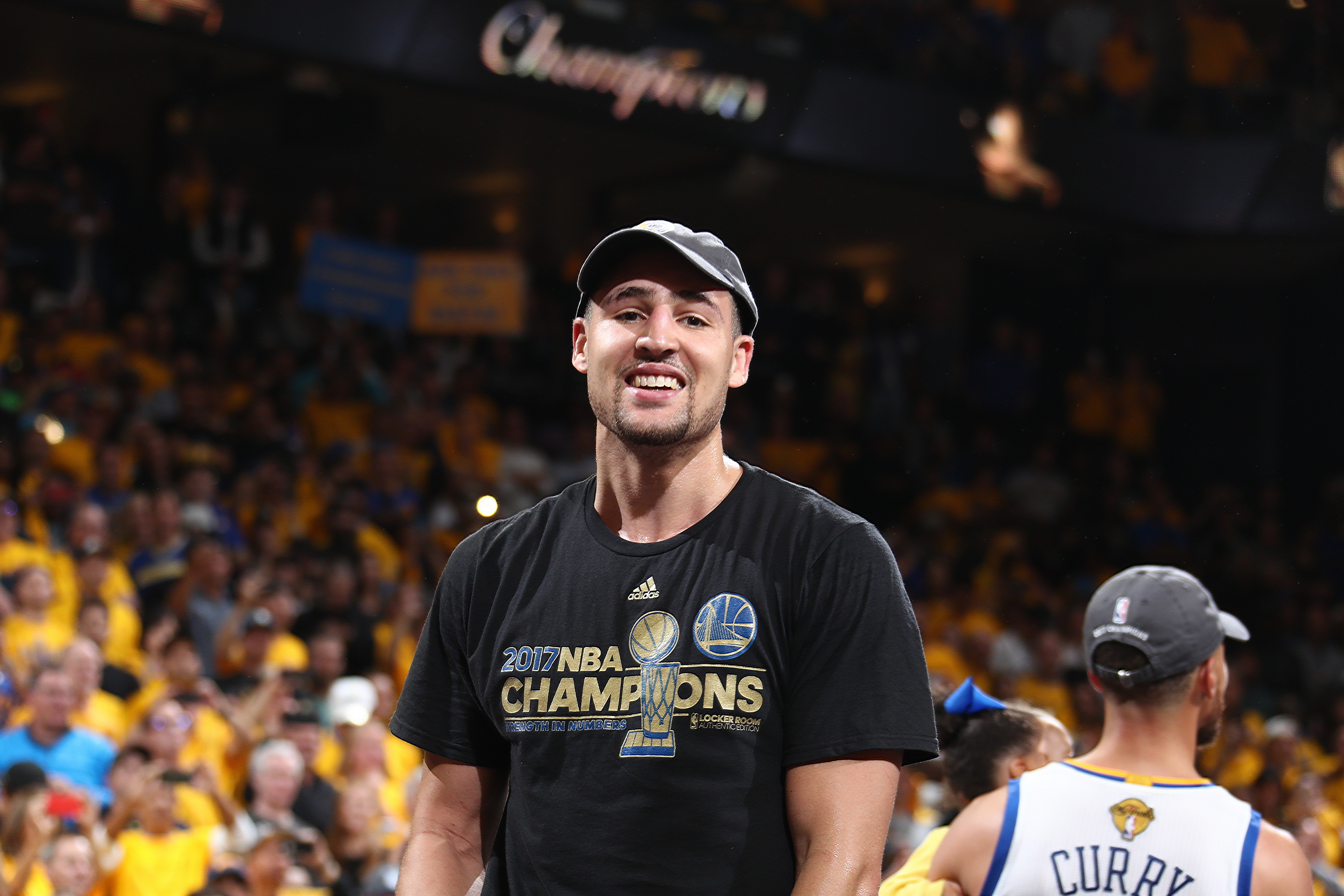 OAKLAND, CA - JUNE 12: Klay Thompson #11 of the Golden State Warriors smiles and celebrates after winning Game Five of the 2017 NBA Finals against the Cleveland Cavaliers on June 12, 2017 at Oracle Arena in Oakland, California. NOTE TO USER: User expressly acknowledges and agrees that, by downloading and or using this photograph, user is consenting to the terms and conditions of Getty Images License Agreement. Mandatory Copyright Notice: Copyright 2017 NBAE (Photo by Nathaniel S. Butler/NBAE via Getty Images)