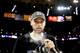 OAKLAND, CA - JUNE 12: Stephen Curry #30 of the Golden State Warriors smokes a cigar after defeating the Cleveland Cavaliers 129-120 in Game 5 to win the 2017 NBA Finals at ORACLE Arena on June 12, 2017 in Oakland, California. NOTE TO USER: User expressly acknowledges and agrees that, by downloading and or using this photograph, User is consenting to the terms and conditions of the Getty Images License Agreement. (Photo by Ezra Shaw/Getty Images)