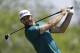 Dustin Johnson tees off on the fifth hole during the second round of the Memorial golf tournament, Friday, June 2, 2017, in Dublin, Ohio. (AP Photo/Darron Cummings)