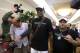 Former NBA basketball star Dennis Rodman, center, arrives at Sunan International Airport on Tuesday, June 13, 2017, in Pyongyang, North Korea. Rodman has arrived in North Korea on his first visit since President Donald Trump took office. (AP Photo/Kim Kwang Hyon)