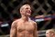 TJ Dillashaw is seen after his fight against Dominick Cruz in their mixed martial arts title bout at UFC Fight Night 81, Sunday, Jan. 17, 2016, in Boston. Cruz won via split decision and is the new UFC Bantamweight Champion. (AP Photo/Gregory Payan)