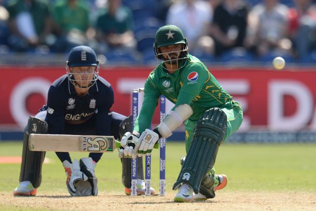 CARDIFF, WALES - JUNE 14 : Azhar Ali of Pakistan bats watched by Jos Buttler of England during the ICC Champions Trophy match between England and Pakistan at Swalec stadium on June 14, 2017 in Cardiff, Wales. (Photo by Philip Brown/Getty Images)